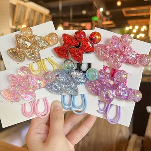Colorful glittery bow hair ties set for girls featuring vibrant resin beads and elastic bands