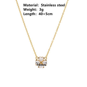 Elegant gold titanium steel necklace with heart-shaped white gems in clover design