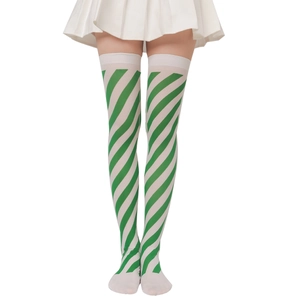 Detail of green and white diagonal striped over-knee socks with elastic knit texture
