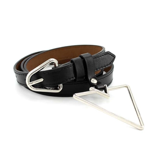 Detail of black leather belt featuring a unique silver metal triangle buckle and charm