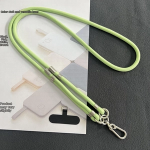 Detail of adjustable 8mm light green crossbody phone lanyard with silver metal buckle