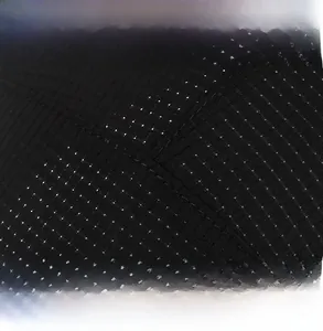 Detail of black ice silk fabric showing breathable mesh holes and fine double stitching