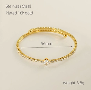 Polished 18k gold plated stainless steel bangle with zircon stones and 56mm inner diameter
