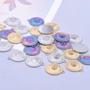 Polished 18k gold and silver stainless steel round pendant charms with embossed details