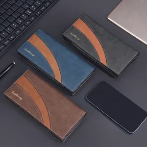 Close-up of three long PU leather men's business wallets in black blue and brown colors