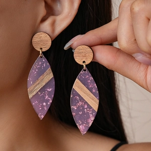 Bohemian leaf drop earrings with wood and magenta resin featuring gold foil details