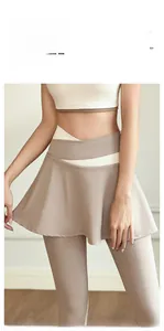 Detail view of high-waist yoga skort with cross-waist design and A-line pleated skirt