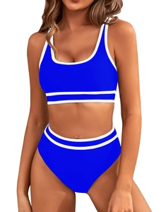 Detail of royal blue two-piece sporty bikini with white trim and high-waisted bottoms