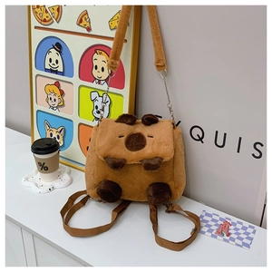 Macro detail of cute brown plush capybara backpack showing soft texture and 3D features