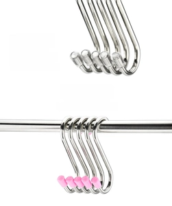 Detail of heavy-duty stainless steel S-hooks with protective clear and pink plastic caps