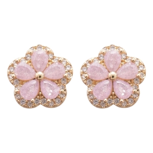 Pink zircon flower earrings with gold plating and sparkling crystals on white background