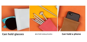Versatile faux leather pouches storing glasses, brushes, and phone in grey, pink, and brown