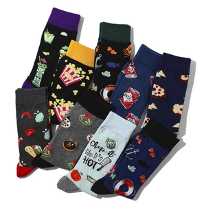 Detail showing high-density knit cotton crew socks with fun food patterns and elastic cuffs