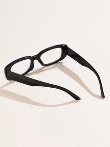 Detailed back view of sleek black thick-frame glasses with wide temples in retro style