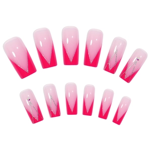 Detail of pink gradient coffin nails with magenta V-french tips and rhinestones