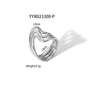 Detail view of silver wavy stainless steel ring with dimensions 1.8cm inner diameter
