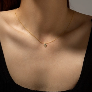 Elegant gold S925 silver Hamsa hand necklace with zircon devil eye pendant on model