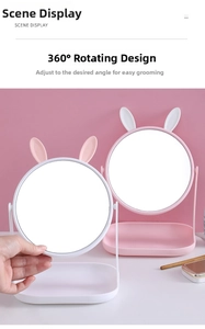 Detail of cute rabbit-ear makeup mirror with 360-degree rotation and storage base tray