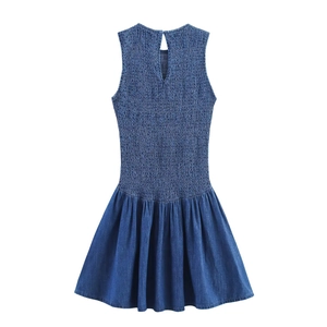 Blue sleeveless denim dress featuring a smocked bodice and pleated skirt on a white background