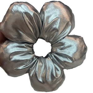 Silver metallic fabric flower scrunchie with a reflective 3D blossom design for women
