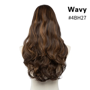 Detailed back view of long wavy U-part hair extensions in brown with blonde highlights