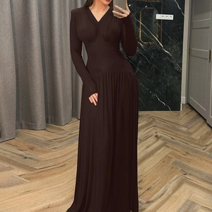 Detail view of deep brown V-neck maxi dress with long sleeves and cinched waistline