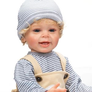 Lifelike 55cm baby doll Yannik with blonde hair wearing grey striped hat and overalls