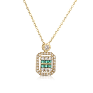 Luxury gold necklace featuring a green square gemstone pendant with diamond accents