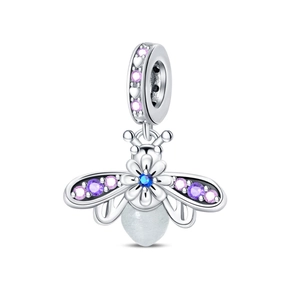 Macro detail of bee pendant with silver finish and colorful zircon stone inlay