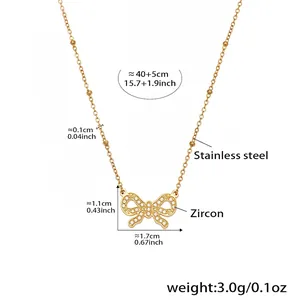 Detail view of golden stainless steel butterfly pendant with zircon inlay and dimensions