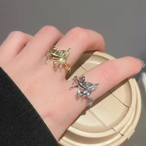 Elegant Pegasus open ring in gold and silver finish with zircon accents for women