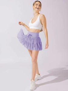 Detail of high waisted purple pleated sports mini skirt with adjustable drawstring ties