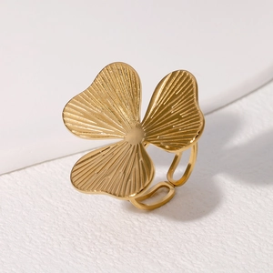 Minimalist gold stainless steel open ring featuring a three-petal flower with brushed texture
