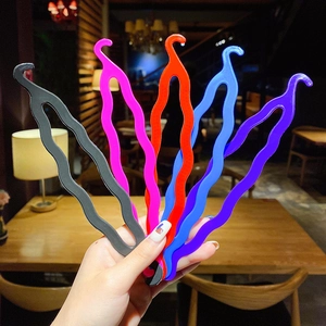 Set of five colorful wavy hair braiding tools for creative hairstyling and buns