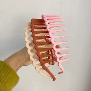 Fashionable wave-toothed plastic headbands in pink, coffee, and beige colors