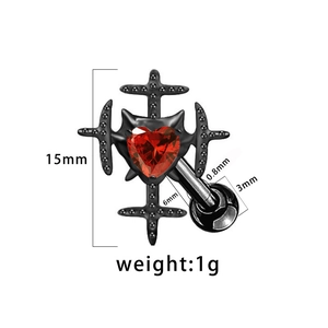 Detail view of heart zircon piercing with dimensions and black metal cross frame