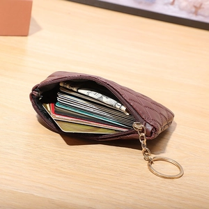 Deep red quilted PU leather coin purse with gold keychain showing large card capacity