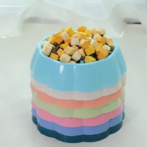 Colorful slow feeder pet bowls in stacked set for dogs and cats with bone pillar design