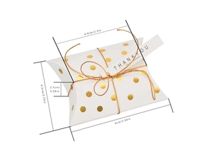 Detailed dimensions of white pillow gift box with gold dots and Thank You tag