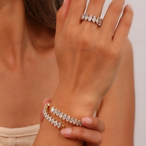 Set bracciale rigido dorato e anello regolabile con zirconi marquise da donna