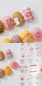 Macro detail of 3D embossed nail art stickers with cute bears and hearts designs