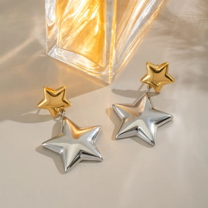Two-tone gold and silver star drop earrings in waterproof stainless steel for women