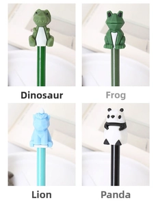 Detail of 3D silicone animal toppers: green dinosaur, frog, blue lion, and panda styles