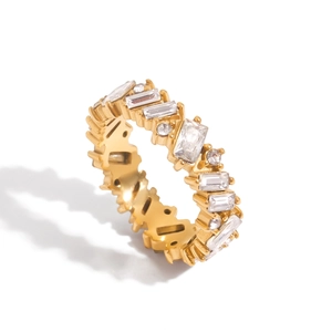 Minimalist 18K gold stainless steel ring featuring white cubic zirconia stones in a modern design