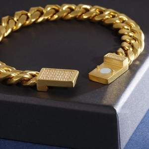 Bracelet gourmette punk en acier inoxydable doré avec fermoir serti de zircons brillants