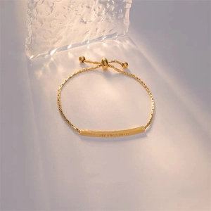 Minimalist gold titanium steel chain bracelet with engraved metal bar and adjustable clasp
