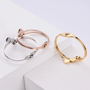 Detailed comparison of open heart bracelets in gold, rose gold, and silver finishes