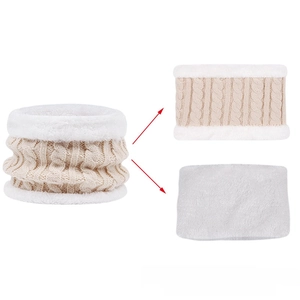 Detail showing the thick cable knit texture and soft white fleece lining of children's neck warmer