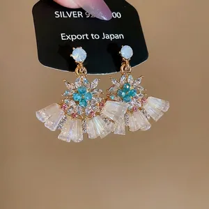 Elegant 925 silver fan-shaped flower earrings with blue crystals and marquise diamonds