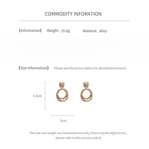 Detailed size infographic of geometric gold earrings showing 5.4cm height and 3cm width